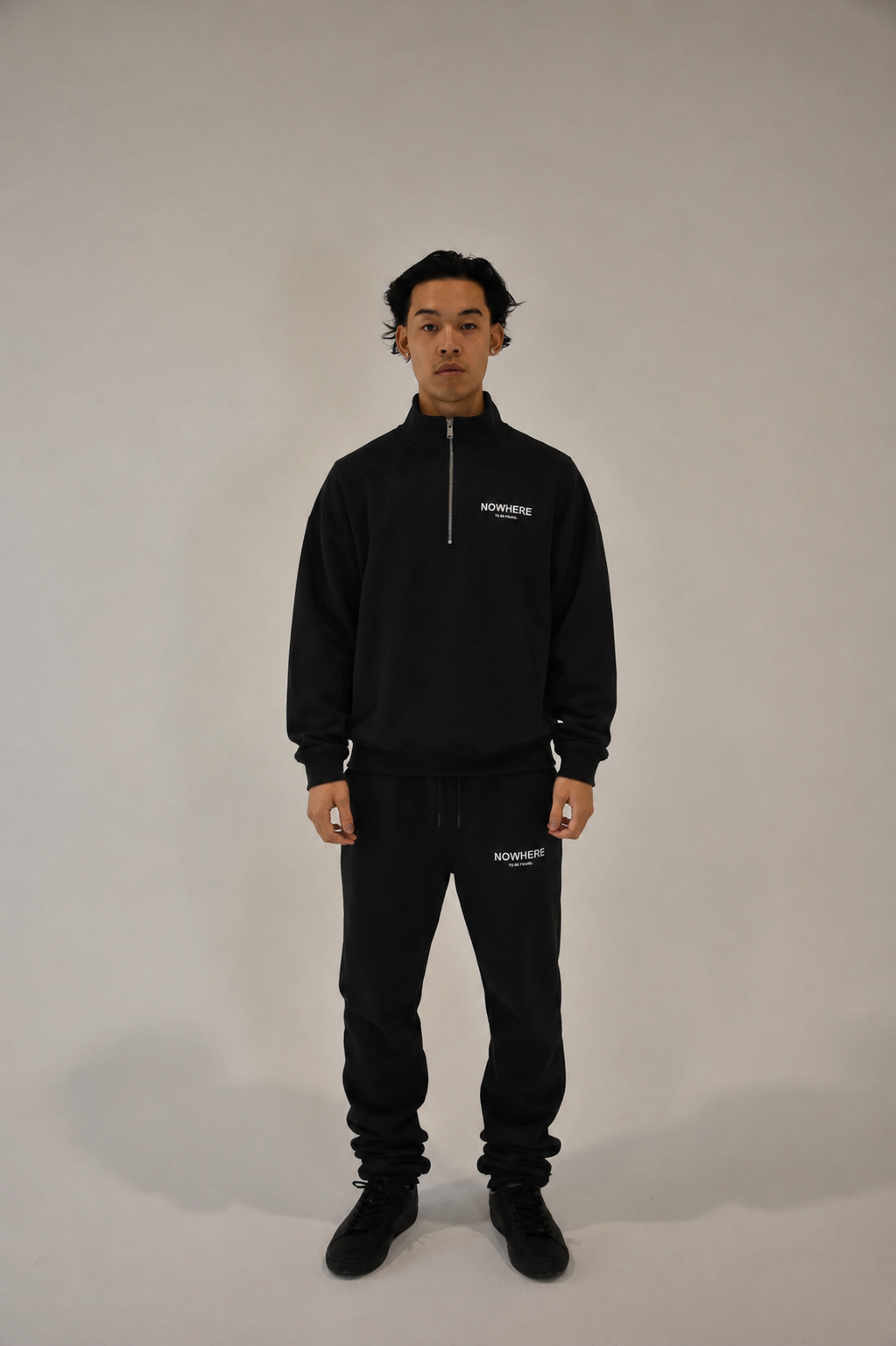 001 “QUARTER ZIP”